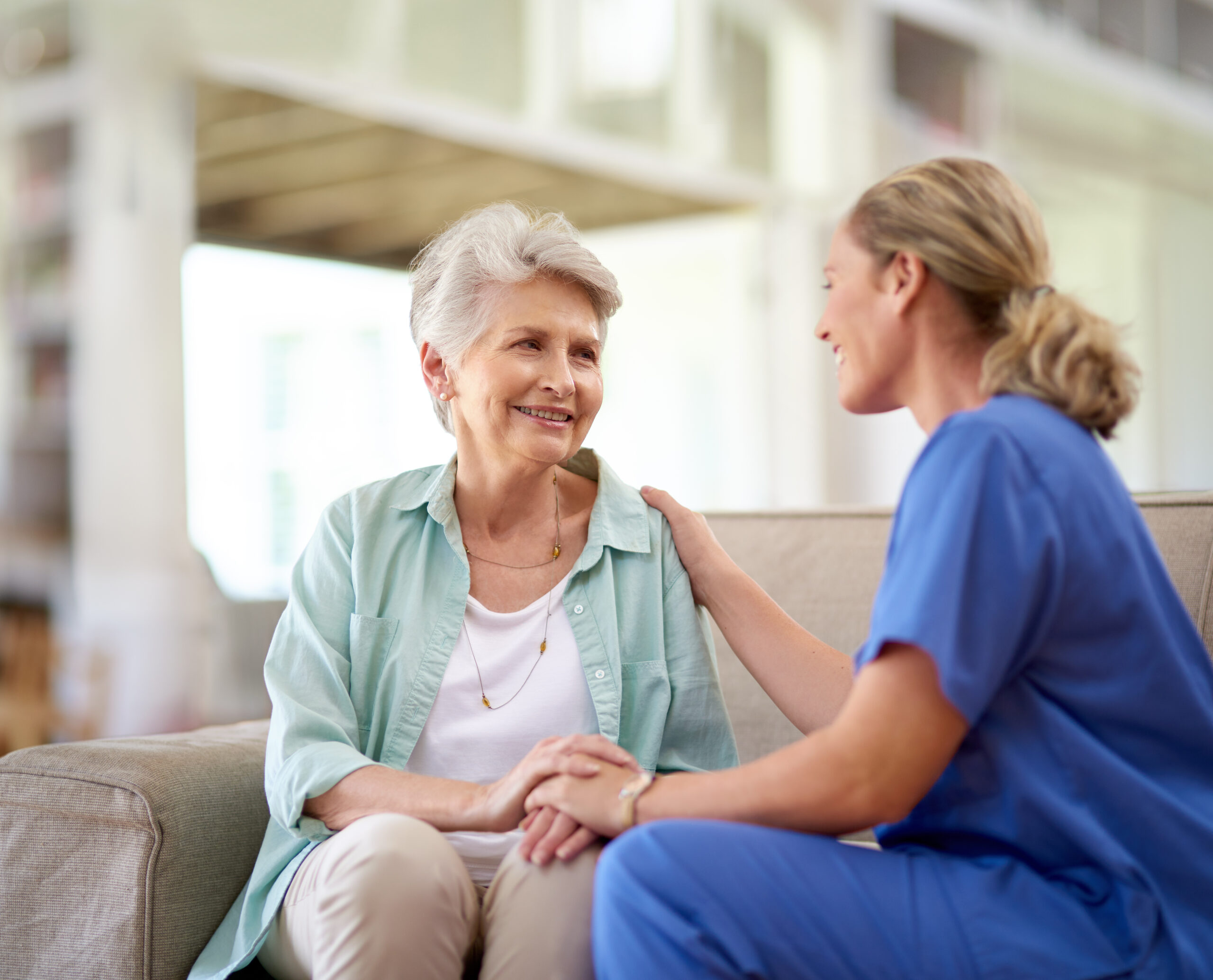 Older adult woman with her caregiver